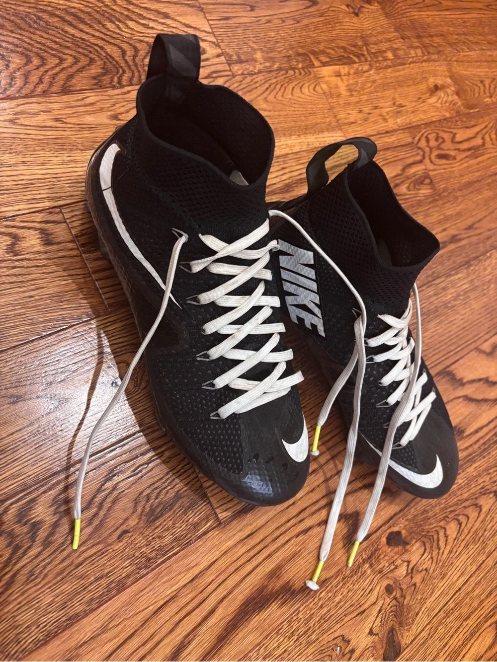 Nike Men’s Black Athletic Cleats with White Swoosh